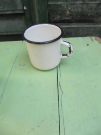 White enamel cup with black border