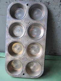 Very nicely edited old muffin tin with 8 compartments