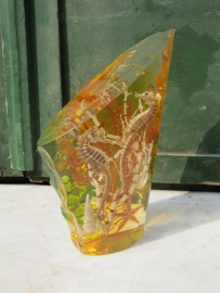 Seahorses and stars in glass