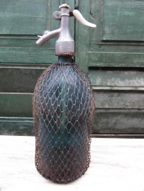 Old blue brocante spray bottle 1 liter with gauze