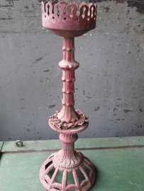 Beautiful old red metal candlestick