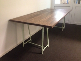 Large work table with metal frame and thick sheet