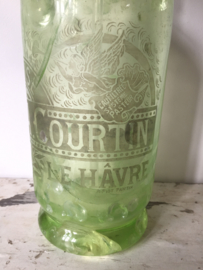 Antieke groene spuitfles met opdruk