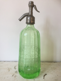 Old bright green French seltzer bottle