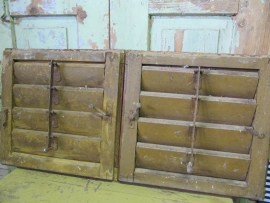 Old set small shutters in ocher yellow
