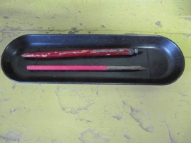 Old tray for pens made of bakelite