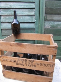 Wooden box with 10 antique wine bottles