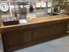 Old wooden large counter with 9 drawers