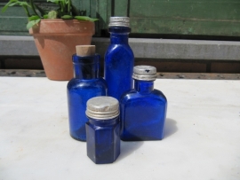 Round Antique French blue bottle.