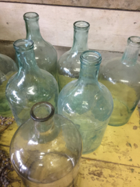 Old bottle with small neck green/clear