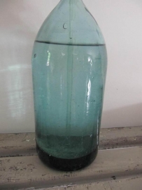 Oude blauw/groene spuitfles