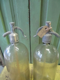 Old seltzer soda bottle of clear glass 2 liters