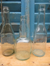 Set of 3 old white glass bottles