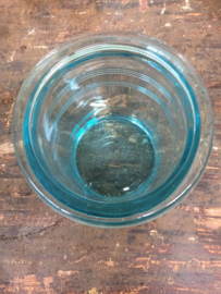 Old glass jar in blue