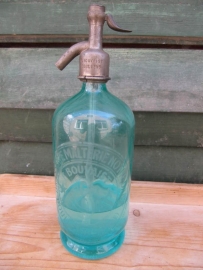 Old  green seltzer bottle with inscription