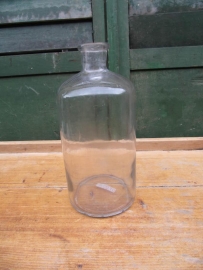 Beautiful old brocante bottle in clear glass