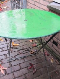 Old metal round folding table
