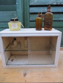 Brocante wooden medicine cabinet with glass sliding door