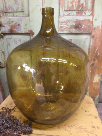 Old glass bottle of 50 liters colour amber