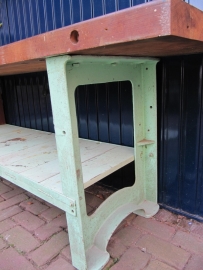 Very old cast iron machine frame with leaf