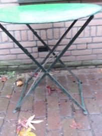 Old metal round folding table