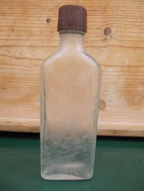 Old clear medicine bottle with screwcap