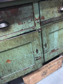 Old industrial green workbench