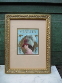 Antique gold frame with old image of Clarita