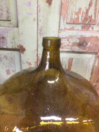 Old glass bottle of 50 liters colour amber