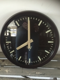 Old industrial clock, bakelite edge black dial
