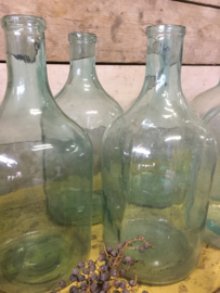 Old bottle with small neck green/clear