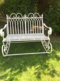 Old metal swing bench