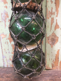 Antique French glass floats in net