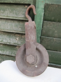 Old metal pulley