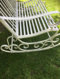 Old metal swing bench