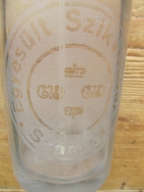 Brocante glazen spuitfles met opschrift