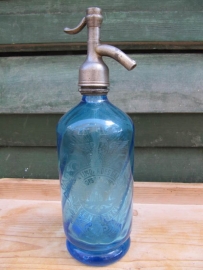 Seltzer soda bottle in blue with inscription