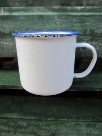 White enamel mug with blue trim