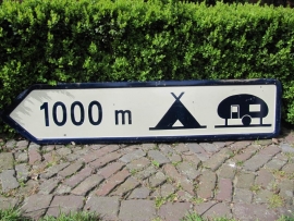 French old sign "Camping" with direction to the left