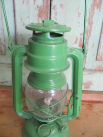 Old green oil lamp
