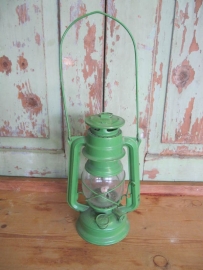 Old green oil lamp