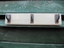 Old hanger with 3 beautiful metal brackets