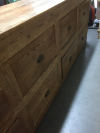 Old wooden large counter with 9 drawers