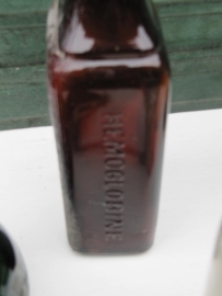 Hele oude bruine fles voor hemoglobine