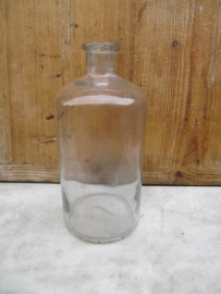 Beautiful old brocante bottle in clear glass