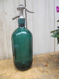 Dark green facet seltzer bottle