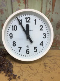 Vintage clock with white frame