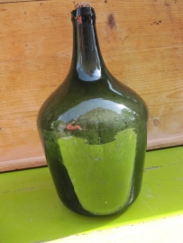 Old green bottle with cork