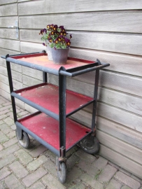 French heavy metal vintage serving trolley on big wheels