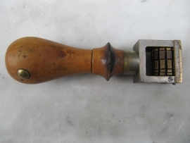 Nice very old numerator or date stamp.